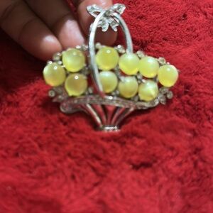 Elegant Silver and Yellow Gemstone Brooch